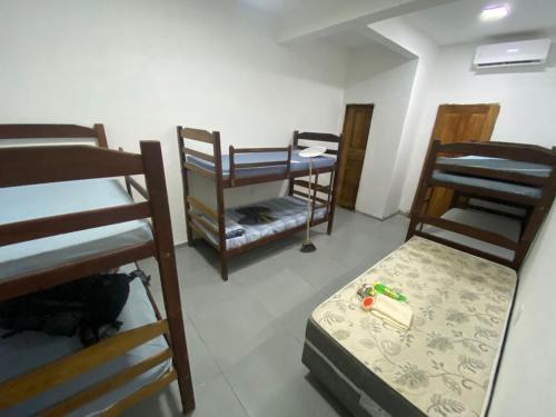 En eller flere senge i et værelse på AeroBelém - Apart & Residence