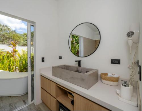 Koupelna v ubytování Antemar Guest, Beach bungalow near Conchal