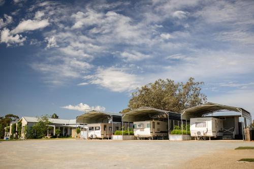 a group of rvs parked in a parking lot at Drovers Run B&B and Events Venue 