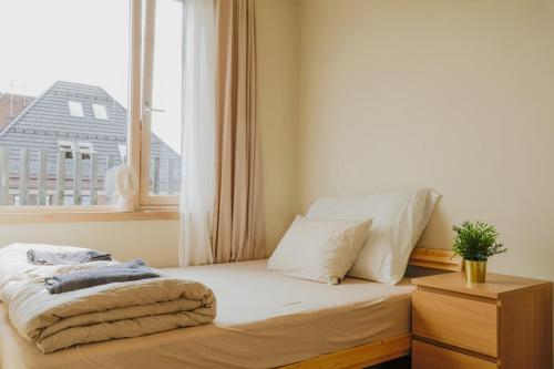 Postel nebo postele na pokoji v ubytování Penthouse apartment 1 bedroom and 1 sofa bed