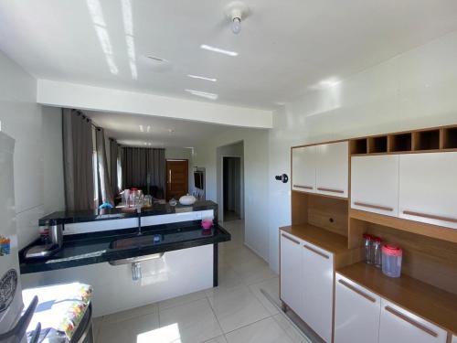 Køkken eller tekøkken på Casa em Condominio São Pedro Aldeia