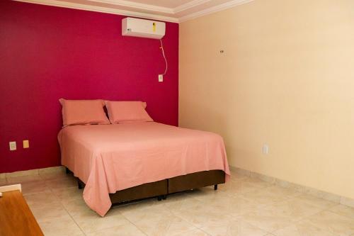 Giường trong phòng chung tại Casa Bela Ventura , Familia e Amor, Intermares, PB