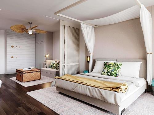 En eller flere senge i et værelse på Mövenpick Balaland Resort Lake Balaton