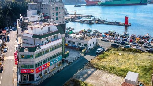 an overhead view of a city with a harbor at Geoje Queen Motel in Geoje