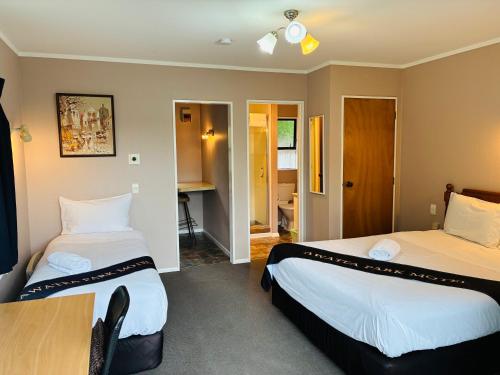 Ένα ή περισσότερα κρεβάτια σε δωμάτιο στο Awatea Park Motel