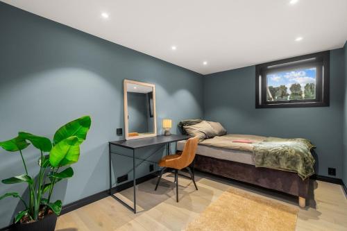 En eller flere senge i et værelse på Grand Junior Suite