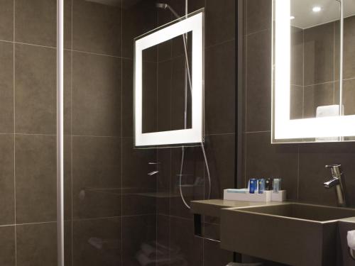 Et badeværelse på Novotel Massy Palaiseau