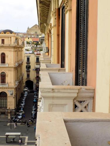 a view of a city street from a building at Hotel Le Orchidee in Naples