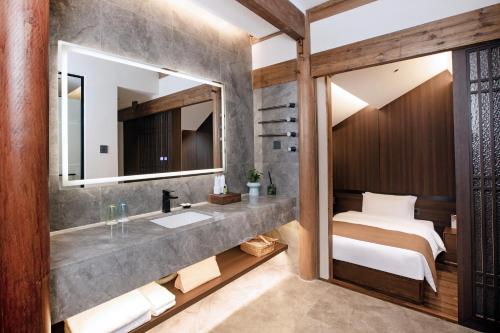 Et badeværelse på Huangshan Bajiazhan Yulin Yuchi Homestay