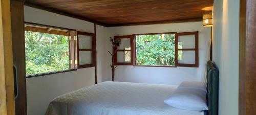 En eller flere senge i et værelse på Casa Vista Mar