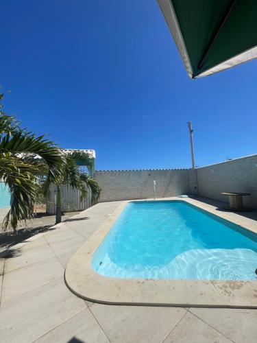 Swimmingpoolen hos eller tæt på espaço de festa do Filipe