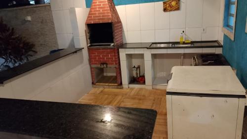 Køkken eller tekøkken på espaço de festa do Filipe