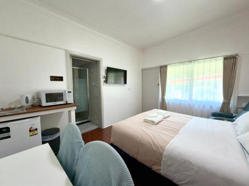 Postel nebo postele na pokoji v ubytování Major Innes Motel