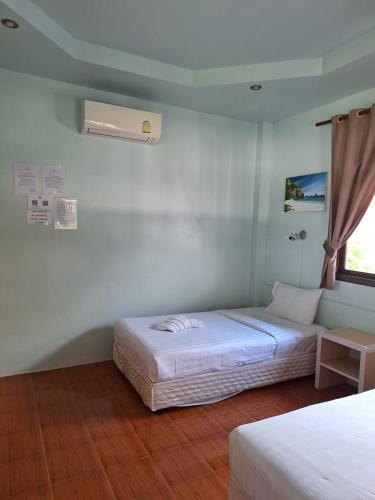 Giường trong phòng chung tại Nice Sea Resort