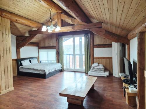 Postel nebo postele na pokoji v ubytování 보성녹차리조트