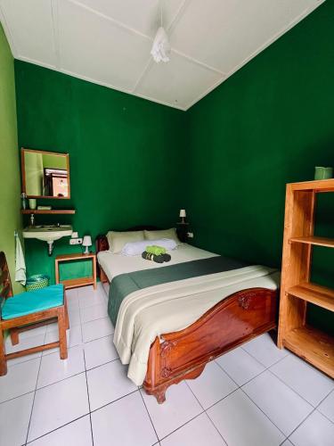 En eller flere senge i et værelse på Hof Warna Guesthouse