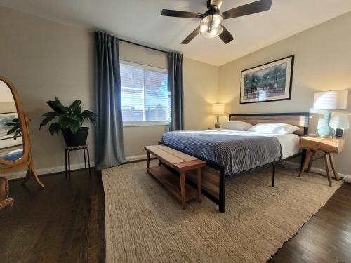 a bedroom with a bed and a ceiling fan at Capitol Hill Adj Home with Parking and Easy Access to Downtown in Washington, D.C.