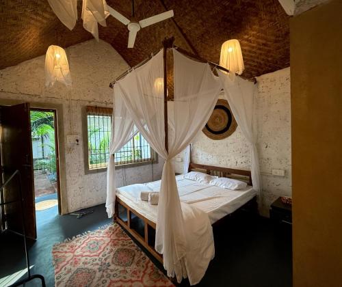 En eller flere senge i et værelse på CASA de SAZU