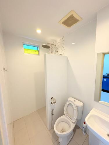 Et badeværelse på Cozy Tropical