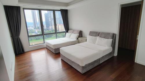 En eller flere senge i et værelse på Pomelo Meet Kuala Lumpur