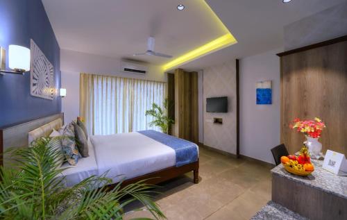 En eller flere senge i et værelse på Foxoso Sonnet, Anjuna Goa