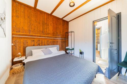 En eller flere senge i et værelse på Cabana Alpinest