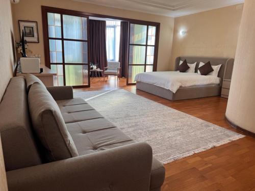 En eller flere senge i et værelse på Apart Hotel 5