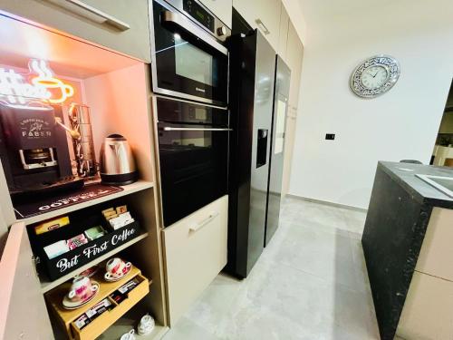 Kuchyň nebo kuchyňský kout v ubytování Milano Bicocca Apartment