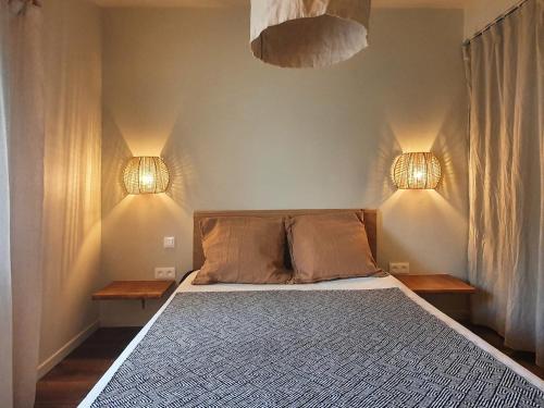 Postel nebo postele na pokoji v ubytování Maison plain-pied avec jardin