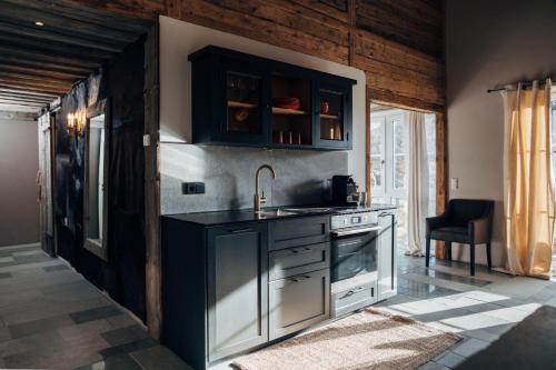 Kuchyň nebo kuchyňský kout v ubytování MOUNTAIN LODGE OBERJOCH - Allgäu