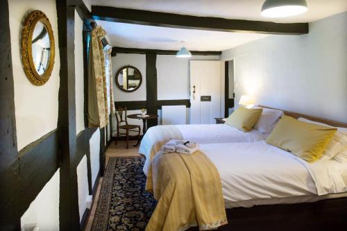 Katil atau katil-katil dalam bilik di Lower Wythall B&B