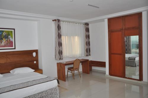 Rosalie's Suitesにあるベッド