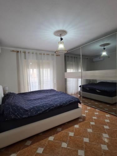 Postel nebo postele na pokoji v ubytování Vollga Promenade Apartments with Full Sea and Old Town View