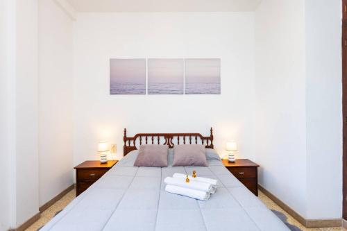 Postel nebo postele na pokoji v ubytování Acogedor apartamento céntrico.