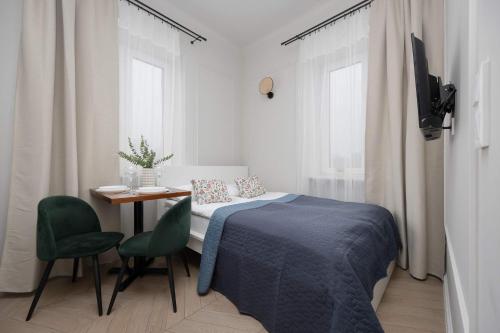 Budget-Friendly Mokotów Micro-Apartment For 2 Guests in Warsaw by Noclegi Renters