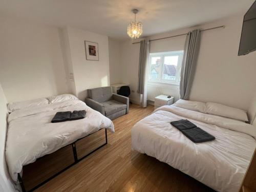 Postel nebo postele na pokoji v ubytování Comfort rooms near City Airport