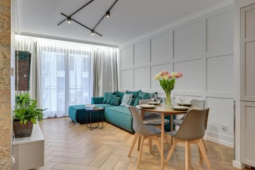 Et opholdsområde på Aura - Riverside & Parking by Downtown Apartments