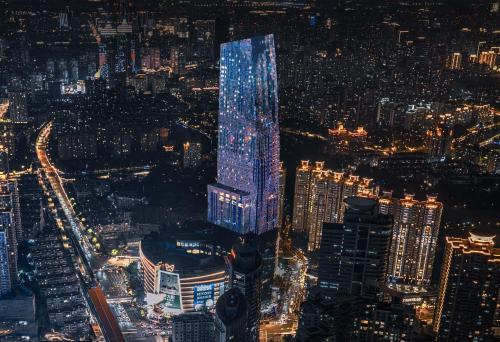 Nespecifikovaný výhled na destinaci Šanghaj nebo výhled na město při pohledu z hotelu