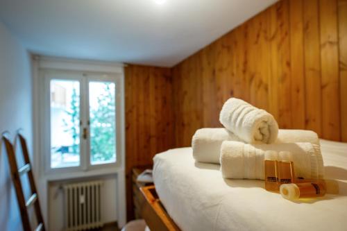 Postel nebo postele na pokoji v ubytování Lo Chalet nel cuore di Courmayeur