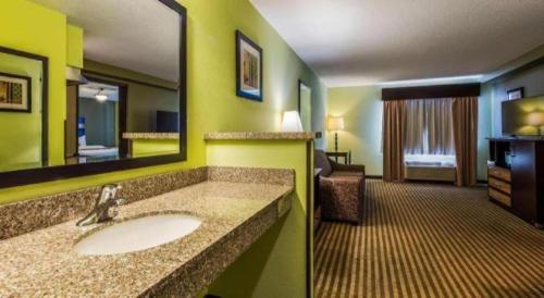 a bathroom with a sink in a hotel room at Best Western Rama Inn in Ephrata