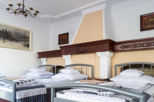 Ένα ή περισσότερα κρεβάτια σε δωμάτιο στο Magic Garden Hostel