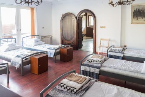 Posteľ alebo postele v izbe v ubytovaní Magic Garden Hostel