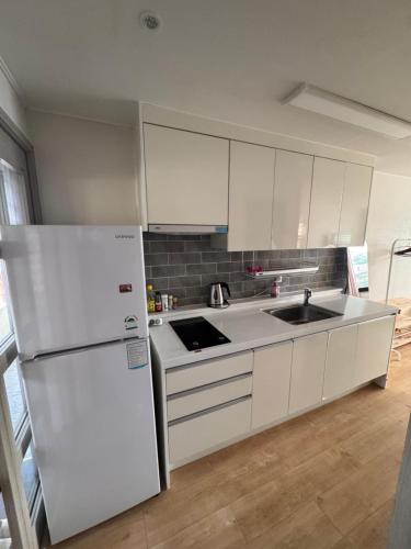 Køkken eller tekøkken på Living in Jeju Island