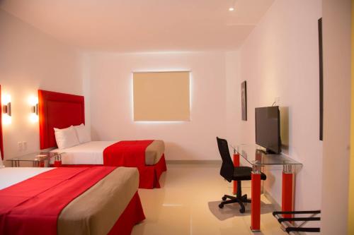 Postel nebo postele na pokoji v ubytování Hotel Zar Merida
