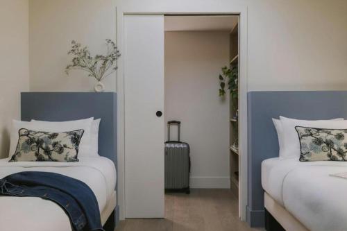 En eller flere senge i et værelse på Crisol Mozart