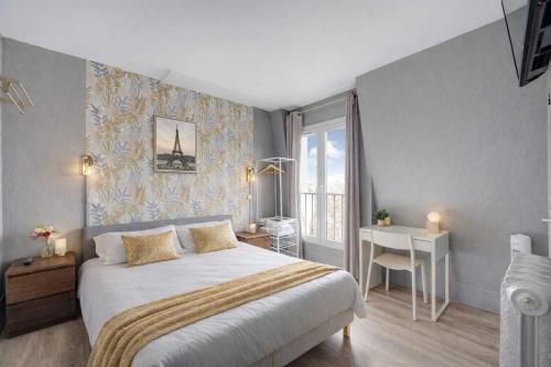 En eller flere senge i et værelse på Relaxing Cosy - 2P - Canal Saint Martin