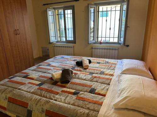 En eller flere senge i et værelse på Pinocchio's house in Ronchi dei Legionari