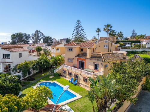 an aerial view of a villa with a swimming pool at Casa de los Limones by Michael FAMILY VILLA NEAR PUERTO MARINA in Benalmádena