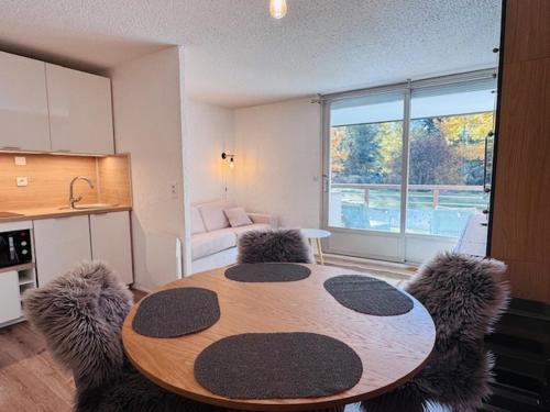 Studio idéal pour 4, au pied des pistes avec grande terrasse