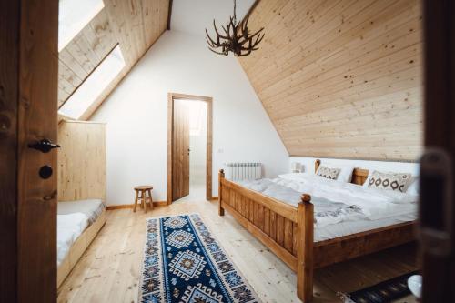 Giường trong phòng chung tại Chalet De Paul